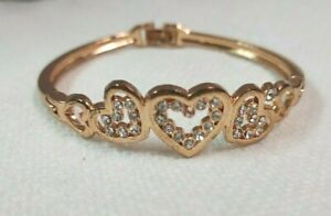 Rose gold tone metal open heart rhinestone bracelet