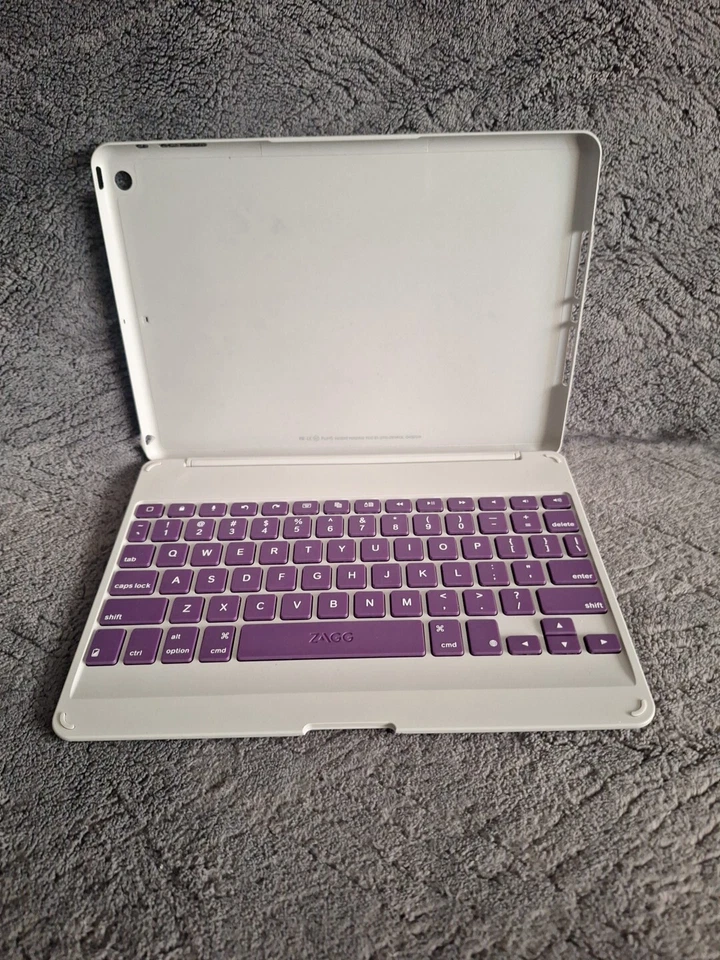 Funda tipo folio ZAGG ID6ZFNPU0, con bisagras con teclado Bluetooth para iPad Air 2 púrpura Foto 1 de 4