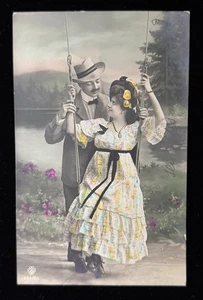 Antique 1909 Hand-Tinted Romance Postcard Couple on Swing Italy Stamp - Picture 1 of 2