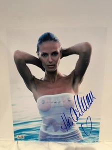 FOTO FIRMADA POR HEIDI KLUM 11X14 AUTO BECKETT SUPERMODELO SI TRAJE SUIZO BAJO CERTIFICADO DE AUTENTICIDAD - Imagen 1 de 2