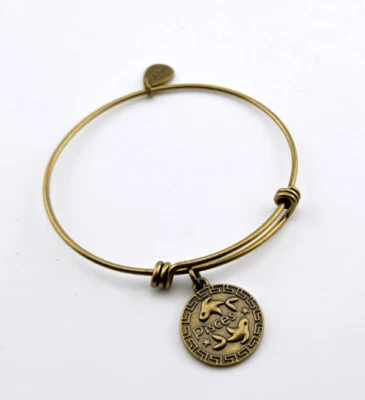 Brazalete Zodiaco Firmado Bella Ryann Tono Dorado Metal Piscis Dije Foto 1 de 2