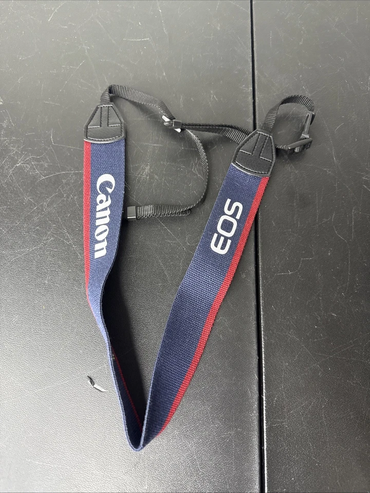 Correa de hombro OEM Cannon EOS azul rojo para SLR/DSLR hecha en Taiwán Foto 1 de 4