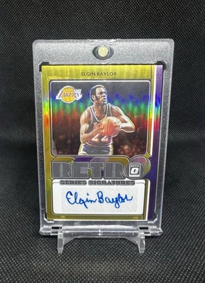 Autógrafo Panini Donruss Optic Elgin Baylor 2020-21 dorado/10 Foto 1 de 4