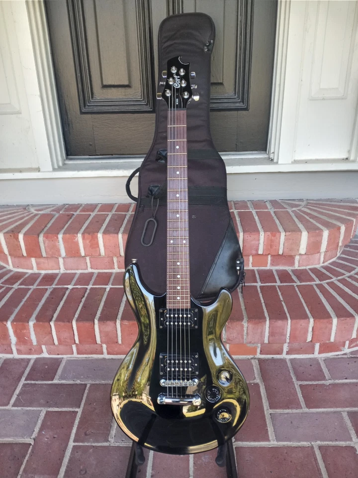 Cort M200 Black Beauty 2002, muy buen estado, configuración y listo para jugar Foto 1 de 4