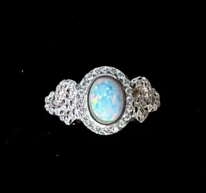 Sterling silver Oval Fire Opal Sparkling Celtic Love Knot Promise Ring size N 7 - Picture 1 of 6