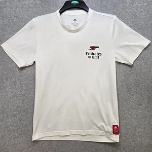 Camiseta The Arsenal Adidas Pequeña Gráfica de Viaje 21/22 Gótica Blanca Cañón 236 - Imagen 1 de 9