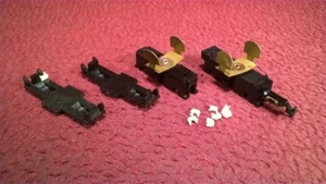 HO TYCO EMD F7A DIESEL LOCOMOTIVE - DUMMY TRUCK FRAMES W MOUNT SPRINGS - Picture 1 of 3