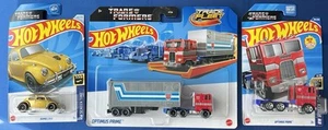 Hot Wheels Transformers 3 Pack, Track Fleet Optimus Prime, Gold Bumblebee - Picture 1 of 5
