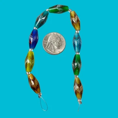 9 African Fancy Feather Glass Beads In Multicolor Blue Green Gold 20mm - Image 1 of 4