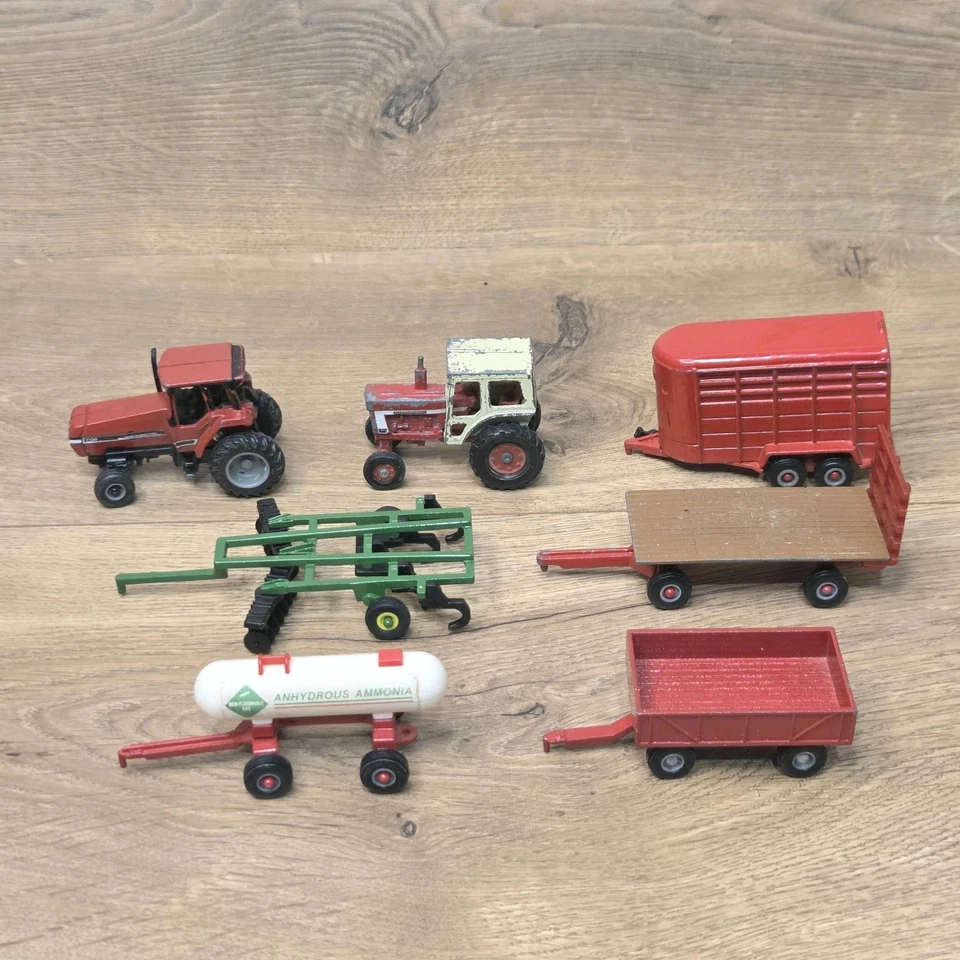 Lote de juguetes agrícolas ERTL de colección 1:64 remolques tractores tanque anhidro arado Foto 1 de 4