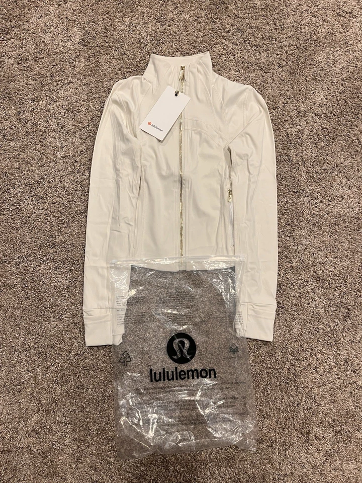 Chaqueta recortada Lululemon Define, blanca para mujer, cremallera dorada talla 4 Foto 1 de 4