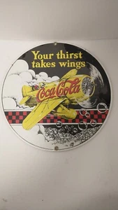 Coca Cola Sign Porcelain Enamel Metal Thirst Takes Wings Andre Rooney Yellow 10" - Picture 1 of 4