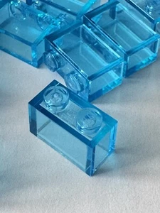 LOT OF 100 BRAND NEW LEGO PIECES BLUE CLEAR TRANSPARENT 1x2 BRICK WALL 3065 - Picture 1 of 3