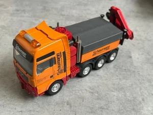 Conrad 1:50 Schaumann MAN TGA XXL 8x4 - Foto 1 di 3