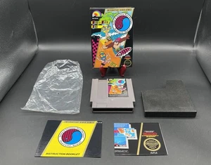 T&C T C Surf Designs Wood & Water Rage Nintendo NES CIB completo di scatola con manuale - Foto 1 di 16
