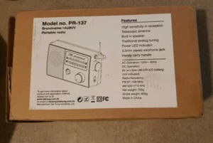 PR-137 AM/FM 2 Band tragbares Radio AC betrieben eingebautes nicht abnehmbares Kabel schwarz - Bild 1 von 3