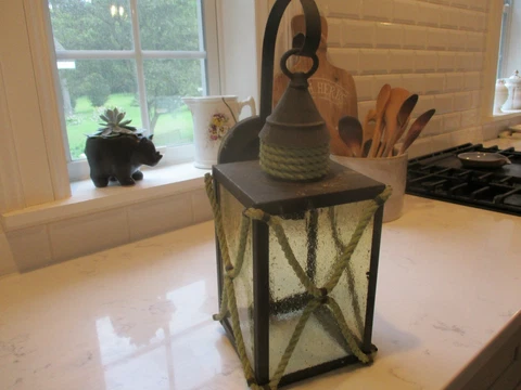 Antique exterior bubble glass porch light/lantern. Green rope Cover