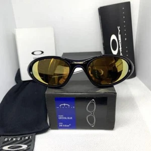 Occhiali da sole Oakley Minute 24K IRIDIUM montatura blu cristallo con scatola e custodia morbida - Foto 1 di 10