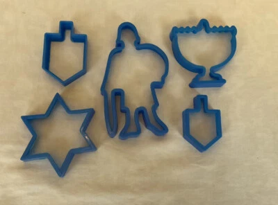Juego de 5 cortadores de galletas Amscan Janucá de plástico azul Foto 1 de 4
