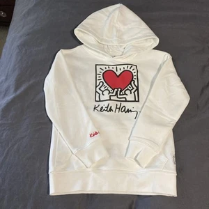 Keith Haring Pullover Hoodie Sweatshirt Kid’s White Figures Heart Pocket M New - Picture 1 of 10