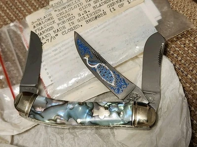 BULLDOG MARCA 3 HOJAS "SOWBELLY" STOCKMAN. MANGOS DE CELULOIDE ABULÓN. PAVO REAL  Foto 1 de 3