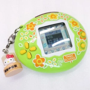 Tamagotchi Plus K-Tama Orange Juice ver w/ Memetch Keychain Strap In Stock - Picture 1 of 7