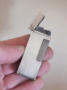 Altes Dunhill Feuerzeug aus versilbertem Metall Switzerland, Patented USA - Bild 1 von 10