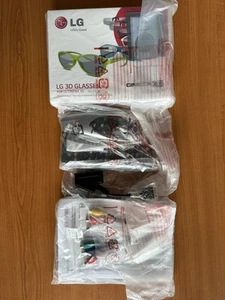 LG Komplettset für 3D Fernseher. 2 Fernbedienungen,2 Paar 3D Brillen und Kabel - Bild 1 von 1