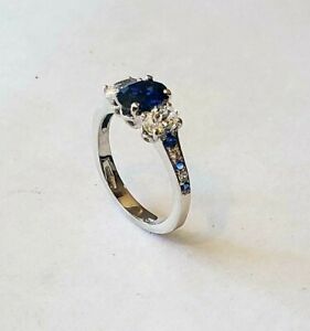 14KT WHITE GOLD THREE STONE SAPPHIRE RING  WITH ACCENT STONES  SIZE 5