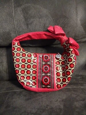 Bolso de mano de plástico con volantes Vera Bradley rosa y marrón con lazo Foto 1 de 4