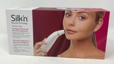 Máquina de microdermabrasión al vacío removedor de espinillas Silk’n Revit Prestige  Foto 1 de 3