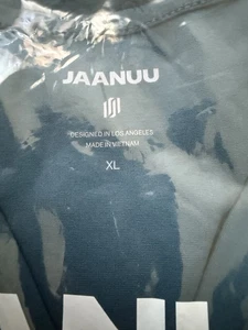 NEW Jaanuu Cesi Scrub Top Women’s Sz XL Slim 2-Pocket UltraSOFT Turquoise - Picture 1 of 5