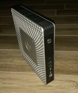 Client léger HP t610 WW AMD GT56N 1,65 GHz 4 Go RAM 16 Go SSD sans système d'exploitation avec adaptateur secteur - Photo 1/5