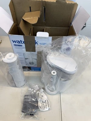Paquete combinado Waterpik Ultra Plus e inalámbrico Pearl Water Flosser - Caja abierta Foto 1 de 4