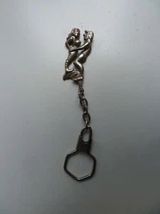 Ancien porte clé à système mobile thème curiosa couple scène érotique  - Picture 1 of 7