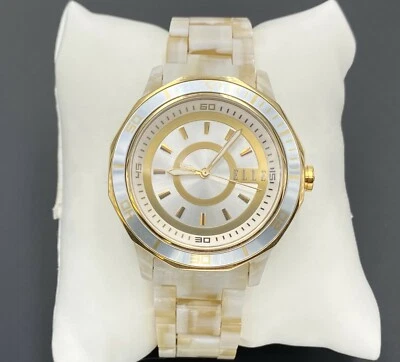 ELLE STYLE COLLECTION MOTHER OF PEARL FACE TAN ACETATE GOLD BAND LADIES WATCH - Image 1 of 4