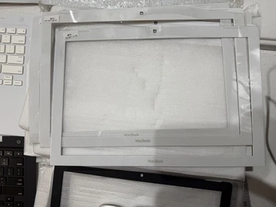 LOT 19x NEW OEM Screen Bezel Trim MacBook 13" A1342 White A1181 Black Wholesale - Image 1 of 4