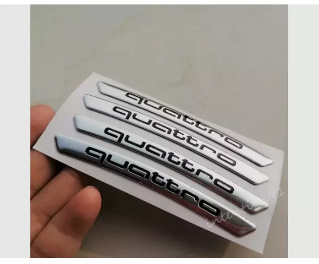 Juego - 4 piezas calcomanías de llanta Quattro de metal 9 cm plateadas para Audi A3 A6 Q7 TT NUEVO Foto 1 de 1