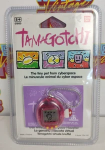 TAMAGOTCHI 1996 1997 NEW SEALED BANDAI MOC GIOCHI PREZIOSI PINK/RED ENGLISH - Foto 1 di 7