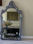 Gilded frame intricate carvings timeless elegance ornate mirror exuding grandeur