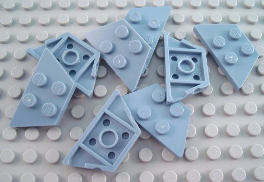 LEGO Lot of 8 Sand Blue 2x4 Wedge Plate Pieces - Image 1 of 1