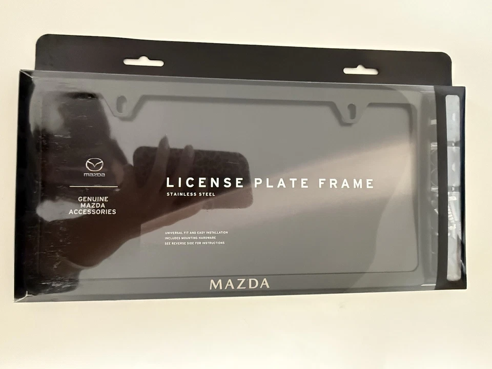 Marco de matrícula genuino Mazda negro Slimline C9N6-V4-027 nuevo en embalaje Foto 1 de 2