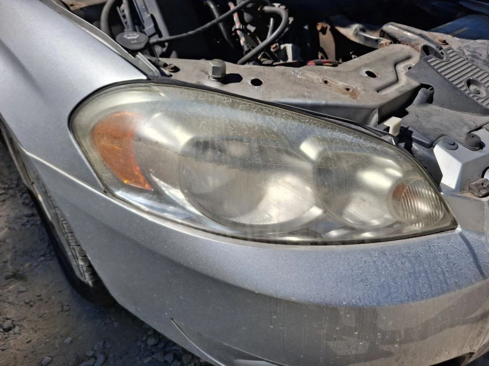 Chevrolet Impala 2010 conjunto de faros para pasajero derecho OEM usados pelados Foto 1 de 1