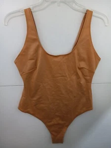 SKIMS Kim Kardashian Wet Look Tank Top Bodysuit Ochre Medium NWT - Picture 1 of 3