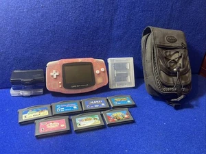 NINTENDO GAME BOY ADVANCED TRANSPARENT PINK FUCHSIA AGB-001 W/ 7 GAMES WORKING - Picture 1 of 23