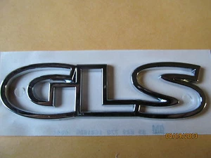 VAUXHALL CORSA ASTRA GLS MALETERO PUERTA TRASERA INSIGNIA EMBLEMA 4 1/4" NOS - Imagen 1 de 1