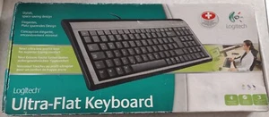 Logitech QWERTY Extra Flach Schweizer Tastatur 105 kabelgebundene Desktop-Tasten USB-PS/2 - Bild 1 von 6
