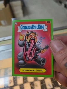 2024 Topps GPK Green Day Garbage Pail Kids Green Parallel Slithering Sam 23B - Picture 1 of 2