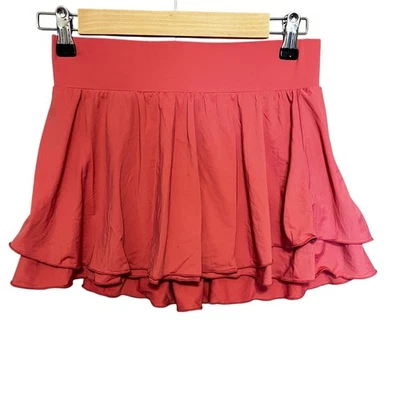 Falda deportiva rosa falda de tenis pequeña con bolsillos dobladillo con volantes en capas ropa deportiva Foto 1 de 4