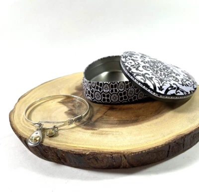 Brazalete Brazalete Brighton Paz en la Tierra con Dije Paloma Tono Plata con Caja Corazón Foto 1 de 4